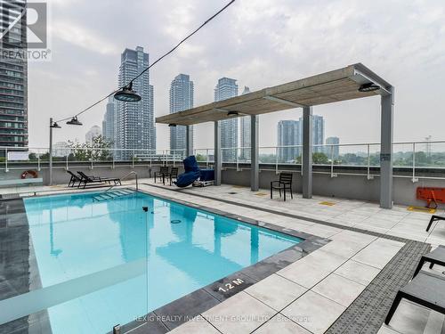 416 - 70 Annie Craig Drive, Toronto, ON - Outdoor With In Ground Pool With Deck Patio Veranda