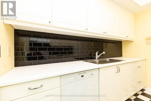 608 - 77 Harbour Square, Toronto, ON - Indoor Photo Showing Kitchen With Double Sink