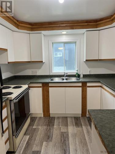 68 St-Aubin Ave, Moonbeam, ON - Indoor Photo Showing Kitchen With Double Sink