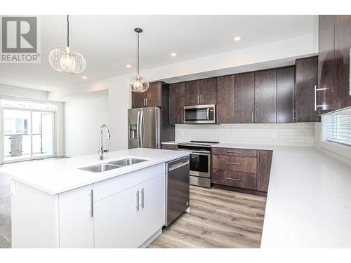 610 Academy Way Unit# 123, Kelowna, BC - Indoor Photo Showing Kitchen With Double Sink With Upgraded Kitchen