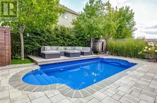 15 Fiddlehead Cres, Hamilton, ON - Outdoor With In Ground Pool