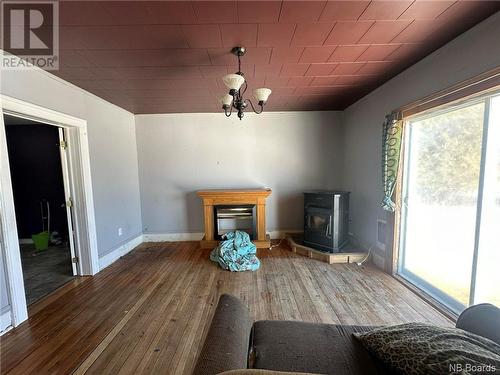 8423 Route 130, Wicklow, NB - Indoor Photo Showing Living Room With Fireplace