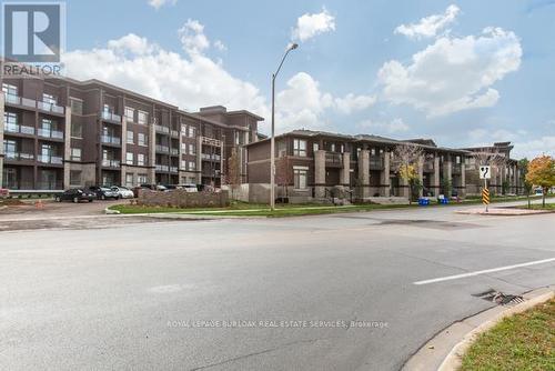 #321 -5010 Corporate Dr, Burlington, ON - Outdoor With Balcony With Facade