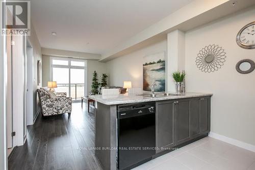 #321 -5010 Corporate Dr, Burlington, ON - Indoor Photo Showing Kitchen With Double Sink