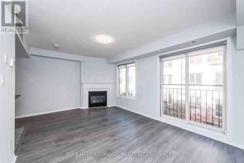 1229 - 22 Laidlaw Street, Toronto, ON - Indoor Photo Showing Living Room With Fireplace
