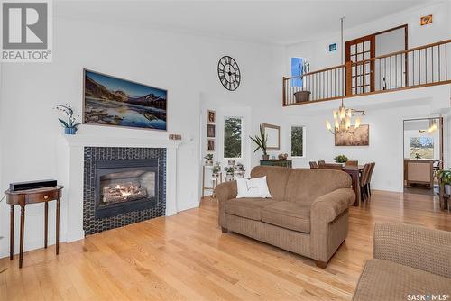 739 Emerald Bay, Saskatoon, SK - Indoor Photo Showing Living Room With Fireplace