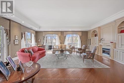 #117 -20 Burkebrook Pl, Toronto, ON - Indoor Photo Showing Living Room With Fireplace