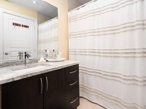 Bathroom - 401-150 Rue Barnett, Dollard-Des-Ormeaux, QC - Indoor With Storage