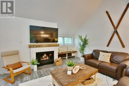207 Escarpment Crescent, Collingwood, ON - Indoor Photo Showing Living Room With Fireplace