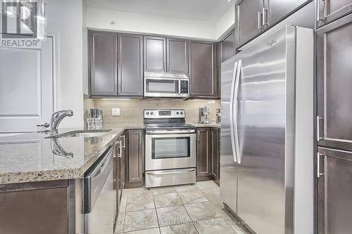 #616 -9255 Jane St, Vaughan, ON - Indoor Photo Showing Kitchen With Upgraded Kitchen