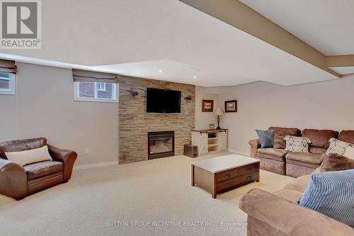 920 Booth Ave, Innisfil, ON - Indoor Photo Showing Basement With Fireplace