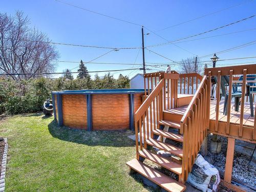 Cour - 120 Rue Vaudreuil, Laval (Chomedey), QC - Outdoor With Above Ground Pool