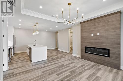 1855 Wyoming Avenue Unit# 211, Lasalle, ON - Indoor Photo Showing Living Room With Fireplace