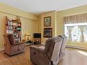 Living room - 1-22 Rue St-Hippolyte, Salaberry-De-Valleyfield, QC  - Indoor With Fireplace 