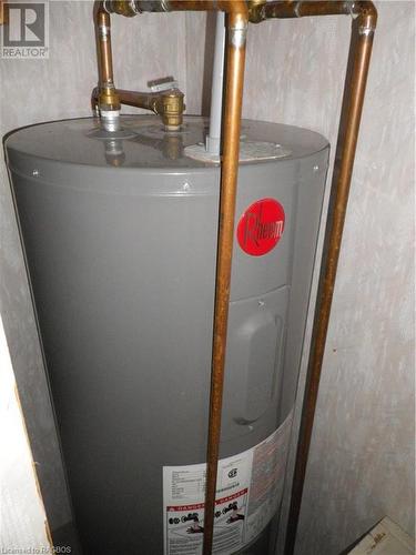 Full Size Water Heater - M46 Mcarthur Lane, Huron-Kinloss, ON - Indoor Photo Showing Basement