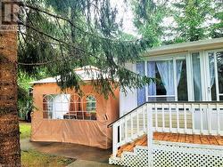 Patio Enclosure and Side Entrance & Deck - 