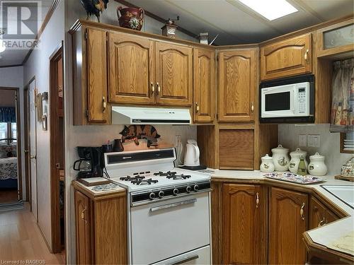Kitchen with Propane Stove - M46 Mcarthur Lane, Huron-Kinloss, ON - Indoor Photo Showing Kitchen