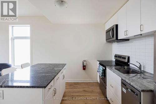 #106 -1780 Simcoe St N, Oshawa, ON - Indoor Photo Showing Kitchen With Upgraded Kitchen