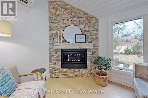 14 York St, Collingwood, ON - Indoor Photo Showing Living Room With Fireplace