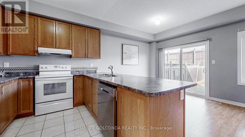 52 Pearcey Cres E, Barrie, ON - Indoor Photo Showing Kitchen With Double Sink