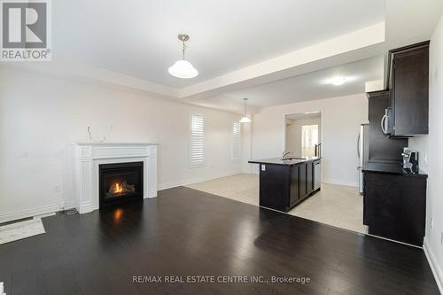 84 Heming Trail, Hamilton, ON - Indoor Photo Showing Living Room With Fireplace