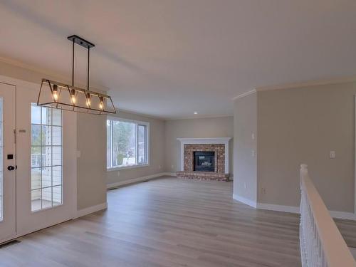 2273 Shannon Ridge Drive, West Kelowna, BC - Indoor Photo Showing Living Room With Fireplace