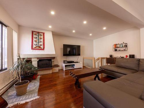 Living room - 4755  - 4757A Rue Jean-Rivard, Montréal (Saint-Léonard), QC - Indoor Photo Showing Living Room With Fireplace