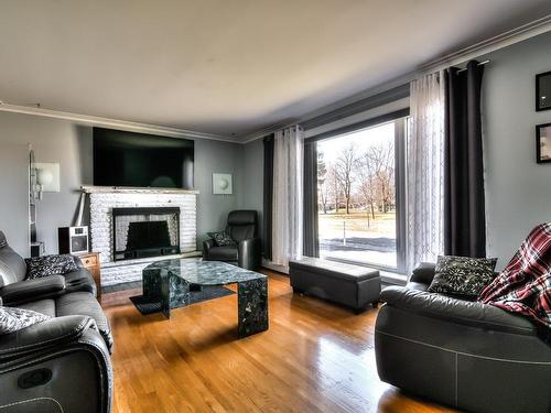 Salon - 385 Rue Jean-De Brébeuf, Saint-Jean-Sur-Richelieu, QC - Indoor Photo Showing Living Room With Fireplace