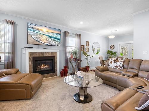 47 Storrie Rd, Campbell River, BC - Indoor Photo Showing Living Room With Fireplace