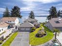 466 Heather Pl, Parksville, BC  - Outdoor With Body Of Water With Facade 