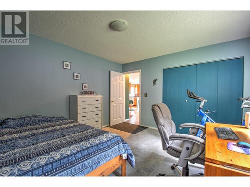 6945 Rugg Road, Vernon, BC - Indoor Photo Showing Bedroom