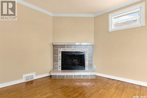 2425 Lindsay Street, Regina, SK - Indoor Photo Showing Living Room With Fireplace
