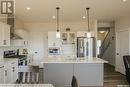 402 Chelsom Manor, Saskatoon, SK  - Indoor Photo Showing Kitchen With Upgraded Kitchen 