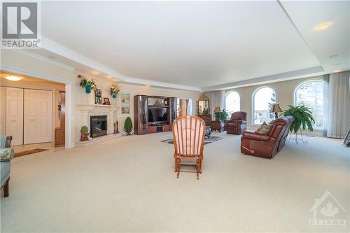 Great Room - 6780 Pilon Point Road, Summerstown, ON - Indoor With Fireplace