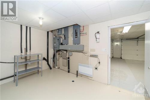 Electrical room with 400 amp service - 6780 Pilon Point Road, Summerstown, ON - Indoor Photo Showing Garage