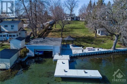 2 slip boathouse, pile driven steel sea wall and cantilevered docks - 6780 Pilon Point Road, Summerstown, ON - Outdoor