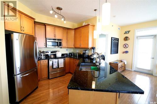 303 2160 Heseltine Road, Regina, SK - Indoor Photo Showing Kitchen With Stainless Steel Kitchen With Double Sink