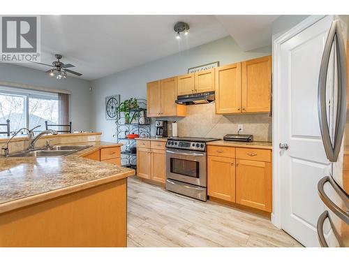 614 South Crest Drive, Kelowna, BC - Indoor Photo Showing Kitchen With Double Sink