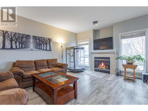 614 South Crest Drive, Kelowna, BC - Indoor Photo Showing Living Room With Fireplace