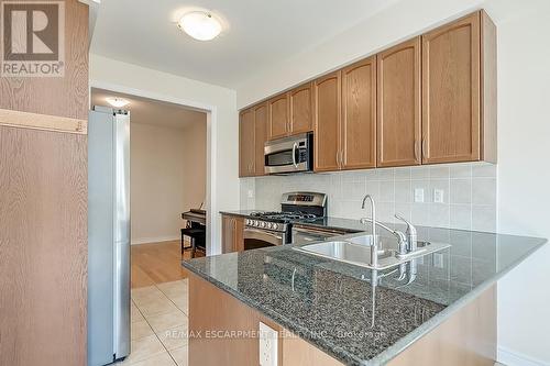 #43 -2019 Trawden Way, Oakville, ON - Indoor Photo Showing Kitchen With Double Sink With Upgraded Kitchen