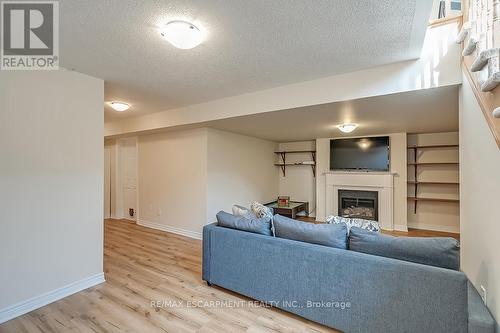 #43 -2019 Trawden Way, Oakville, ON - Indoor Photo Showing Living Room With Fireplace