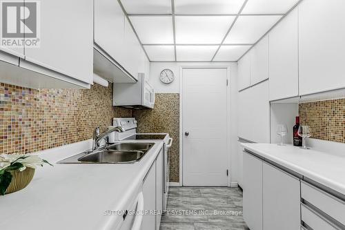 #903 -25 Fairview Rd W, Mississauga, ON - Indoor Photo Showing Kitchen With Double Sink