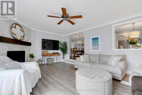 #185 -5193 Cook Rd, Hamilton Township, ON - Indoor Photo Showing Living Room With Fireplace