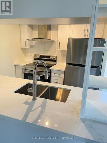 #302 -190 Borough Dr, Toronto, ON - Indoor Photo Showing Kitchen With Double Sink