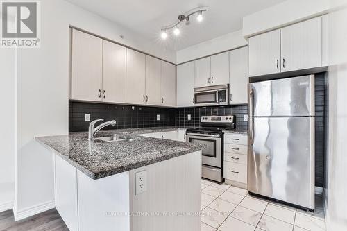 #1207 -9255 Jane St, Vaughan, ON - Indoor Photo Showing Kitchen With Double Sink