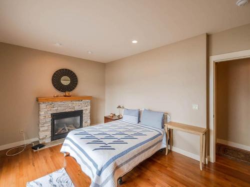 17019 Lakeshore Drive, Summerland, BC - Indoor Photo Showing Bedroom With Fireplace