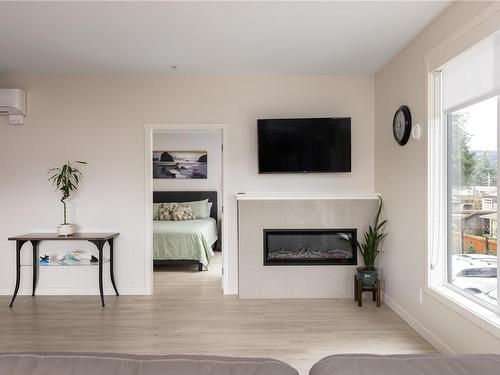 202-810 Orono Ave, Langford, BC - Indoor Photo Showing Living Room With Fireplace