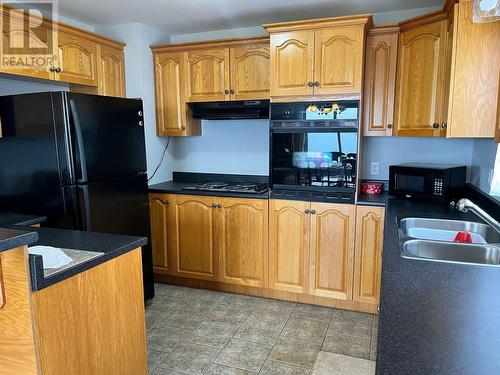 0 Lance Cove Road, Bell Island, NL - Indoor Photo Showing Kitchen With Double Sink