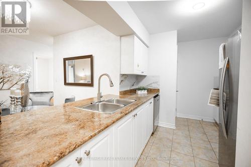 2831 - 3888 Duke Of York Boulevard, Mississauga, ON - Indoor Photo Showing Kitchen With Double Sink