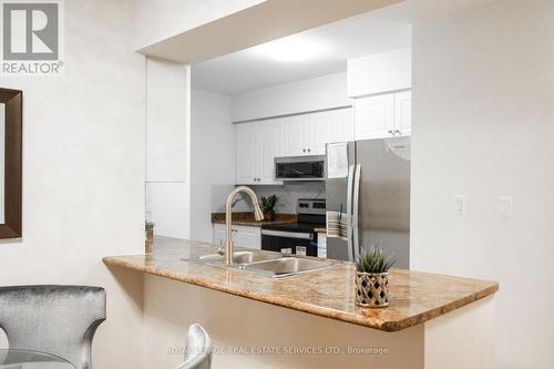 2831 - 3888 Duke Of York Boulevard, Mississauga, ON - Indoor Photo Showing Kitchen With Double Sink